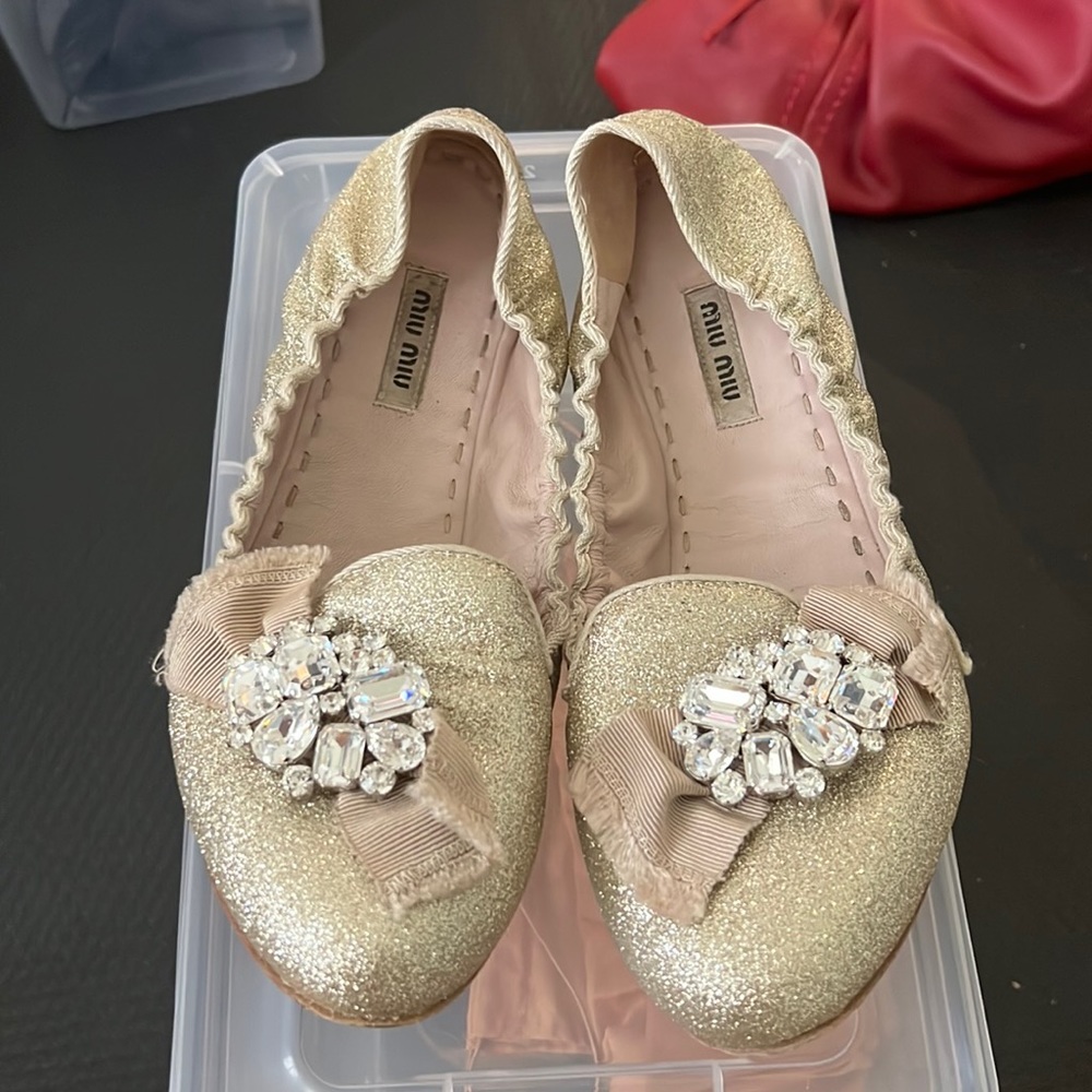 Miu Miu flats gold